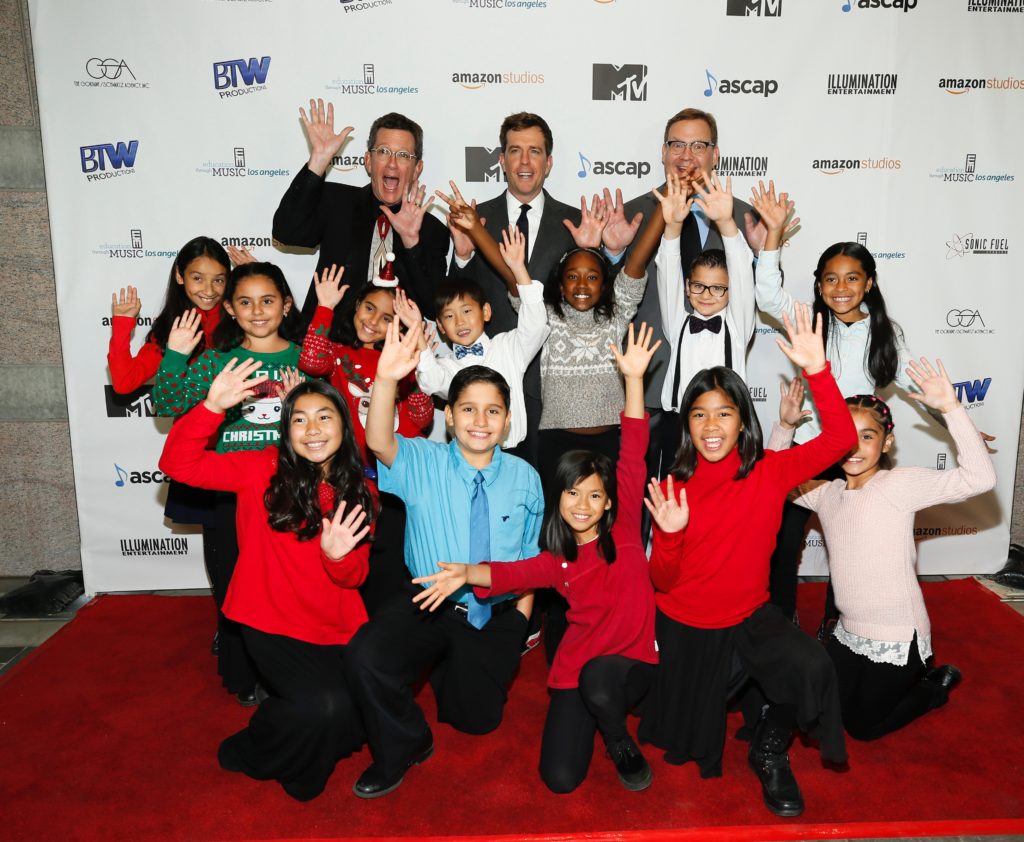Students pose with Shining Star Honorees Ed Helms (center) and Richard Meyer (left), flanked by host Andy Richter (right)